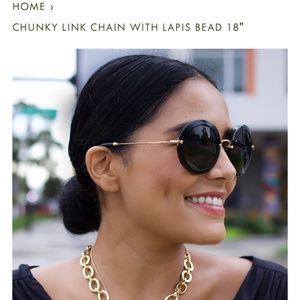 Jane Win chunky gold plated necklace with lapis bead